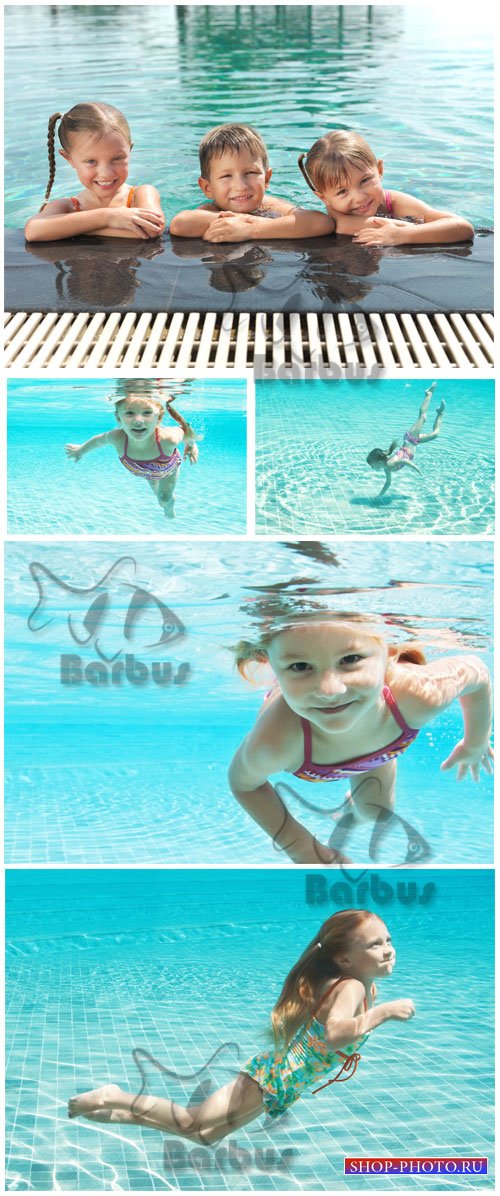 Children swim in the pool / Дети плавают в бассейне - Photo stock