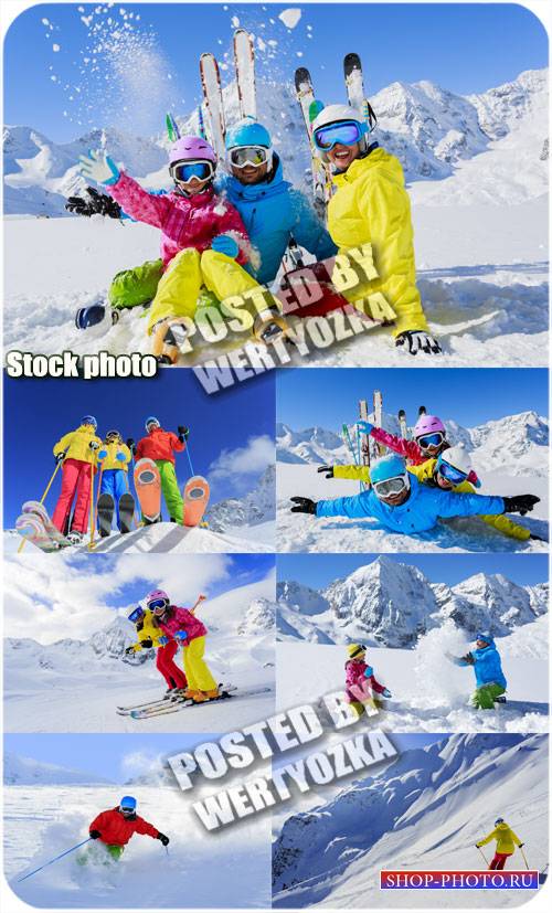 Семейный отдых на горнолыжном курорте / Family fun at ski resort - stock photo