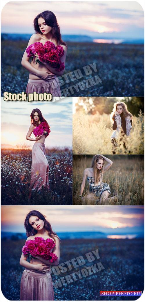 Девушки в поле с цветами / Girls in a field with flowers - stock photo