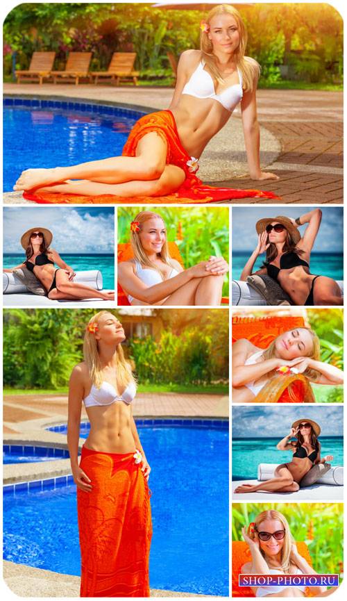 Девушка у бассейна, отдых на море / Girl by the pool, relaxing on the sea - Stock Photo