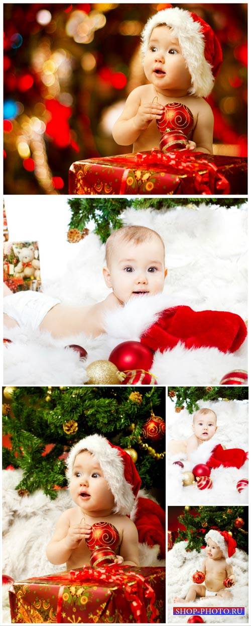 Ребенок у новогодней елки / Child have a Christmas tree - Stock Photo