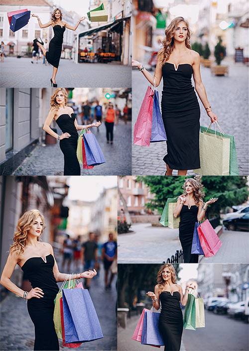 Красивая женщина совершает шоппинг / Beautiful woman makes shopping